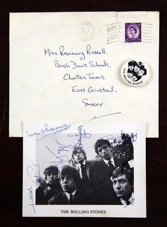 The Rolling Stones: A signed vintage postcard photograph signed by all five members of the band,